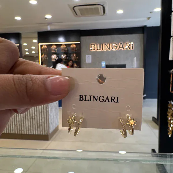 Sting Um - Earrings & Jhumkas from BLINGARI luxury Indian fashion collection